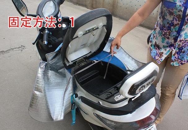 台铃电动车如何打开坐垫箱