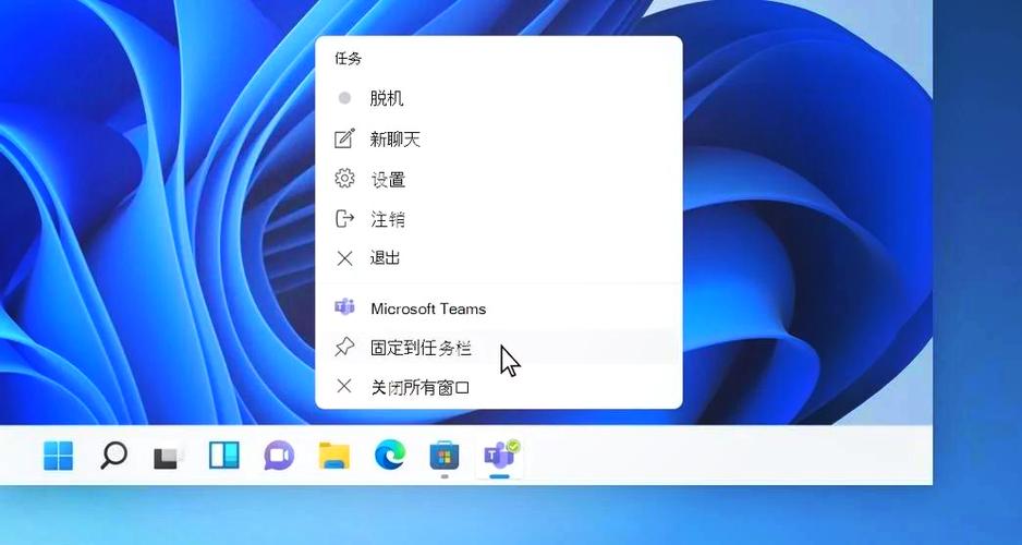 电脑任务栏到上面去了