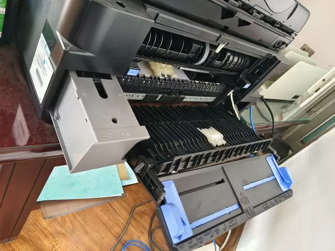 爱普生wf100维护箱更换方法
